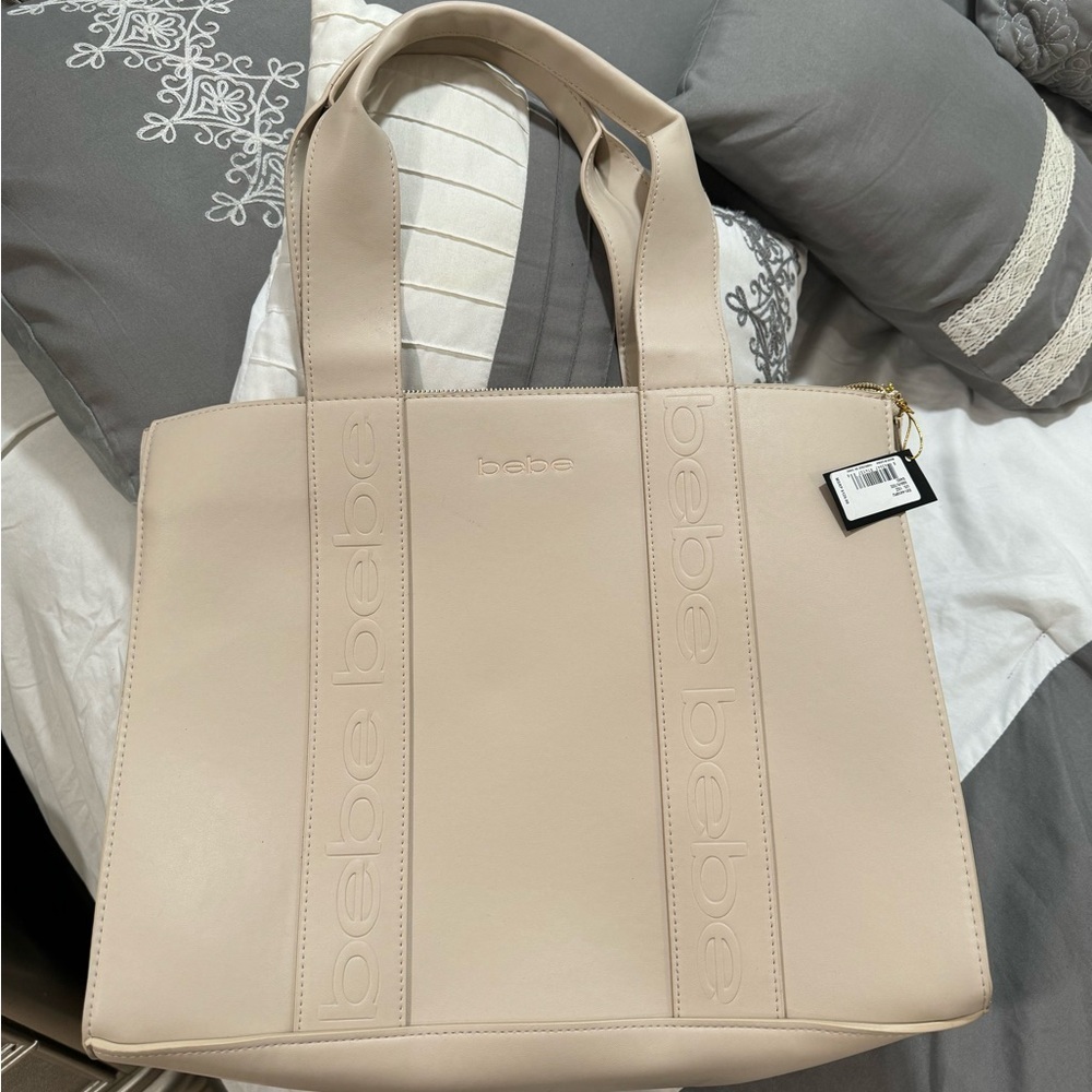 Bebe Womens Hand tote purse brand new with tags never used msrp $129 sand color